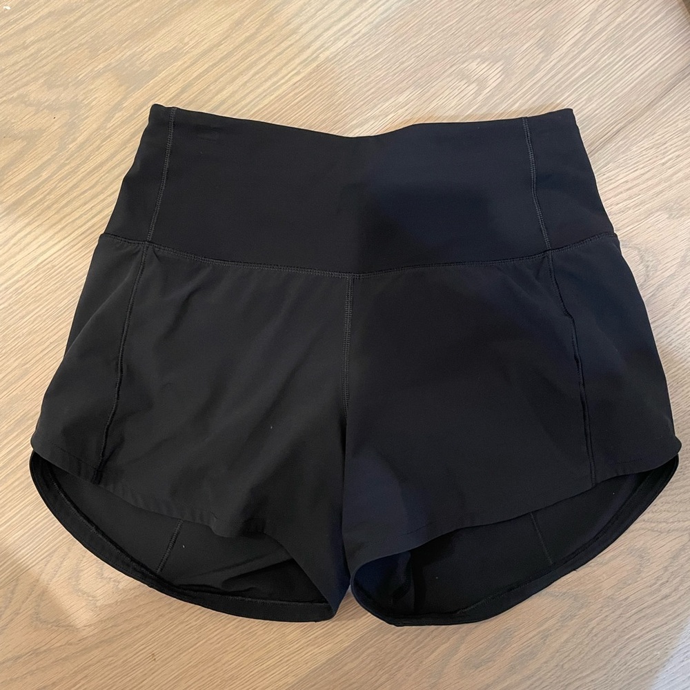 Black lululemon speed up shorts 4in size 2